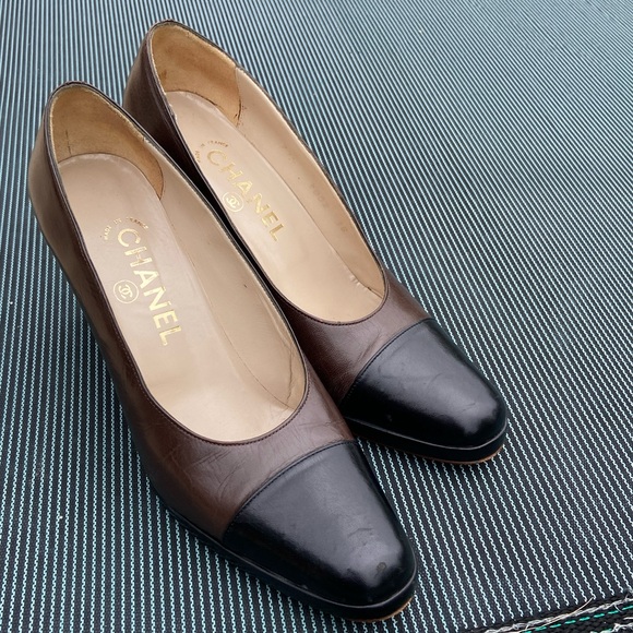 CHANEL Shoes - CHANEL Two-Tone Brown and Black Leather Cap-Toe Pumps